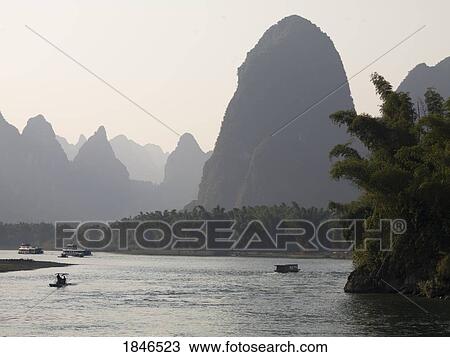 Stock Image - Li river, Yangshuo, Guilin, Guangxi Province, China. Fotosearch