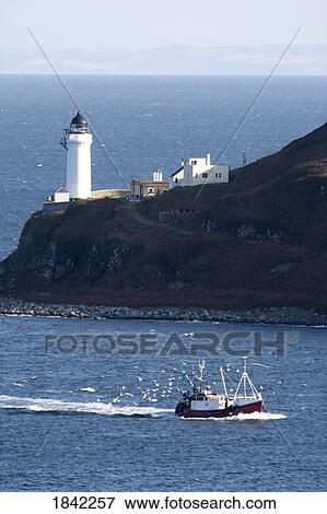 Stock Photo - Lighthouse on the coast, Campbeltown Loch, Island of Davaar, Argyll and Bute, Scotland. Fotosearch