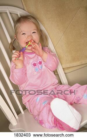 Little Girl Trying To Brush Her Teeth View Large Photo Image Stock Image - Little Girl Trying To Brush Her Teeth. Fotosearch