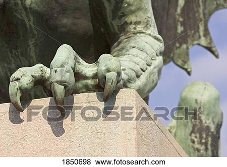 Ljubljana, Slovenia; claws on one of the green copper dragon statues on Zmajski (Dragon Bridge) View Large Photo Image Stock Photo - Ljubljana, Slovenia; claws on one of the green copper dragon statues on Zmajski (Dragon Bridge). Fotosearch