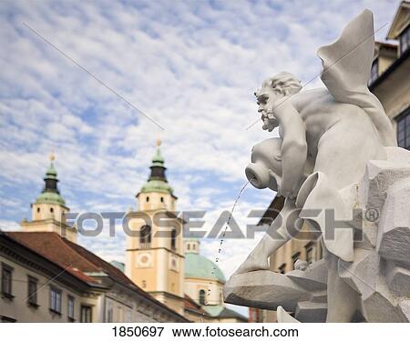 Stock Photo - Ljubljana, Slovenia; Robba Fountain with river god statue. Fotosearch