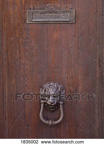 Mail slot and door knocker, Venice, Italy View Large Photo Image Stock Image - Mail slot and door knocker, Venice, Italy . Fotosearch