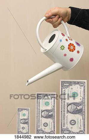 Stock Image - Making money grow. Fotosearch