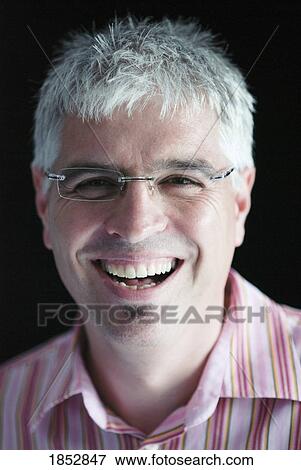 Man; Portrait of a man smiling View Large Photo Image Stock Photo - Man; Portrait of a man smiling. Fotosearch