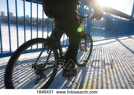 Stock Image - Man riding a bicycle. Fotosearch