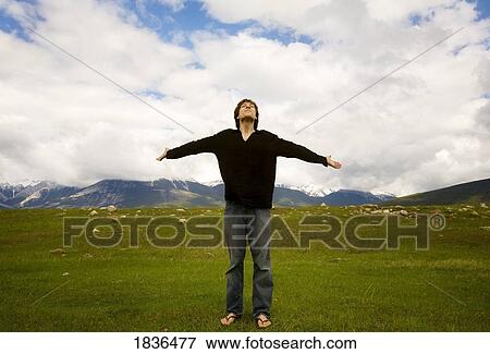 Stock Photo - Man with open arms, Jasper, Canada. Fotosearch