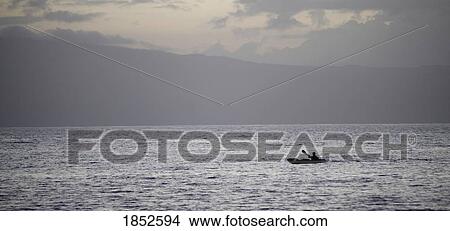 Maui, Hawaii, USA; Kayaker on the ocean View Large Photo Image Picture - Maui, Hawaii, USA; Kayaker on the ocean . Fotosearch