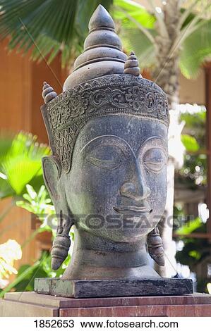Stock Image - Maui, Hawaii, USA; Sculpture of a bust. Fotosearch