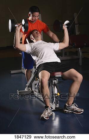 Men lifting weights View Large Photo Image Stock Photo - Men lifting weights. Fotosearch