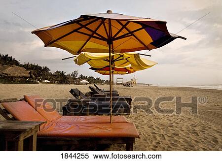 Stock Photography - Mexico; Sun umbrellas and loungers. Fotosearch