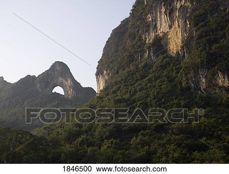 Moon hill in Yangshuo, Guangxi, China View Large Photo Image Stock Image - Moon hill in Yangshuo, Guangxi, China. Fotosearch