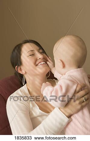Stock Image - Mother and child. Fotosearch