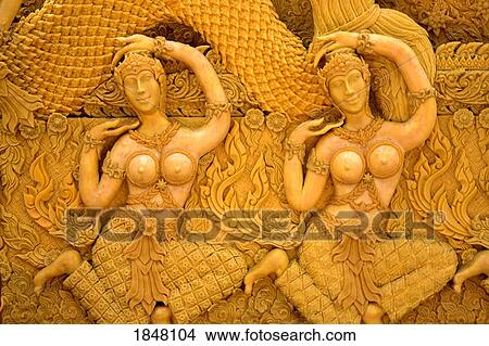 Picture - Nakhon Ratchasima, Thailand, Asia; Candle wax carving. Fotosearch