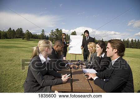 Outdoor business meeting View Large Photo Image Stock Image - Outdoor business meeting. Fotosearch