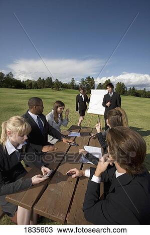 Outdoor business meeting View Large Photo Image Stock Image - Outdoor business meeting. Fotosearch
