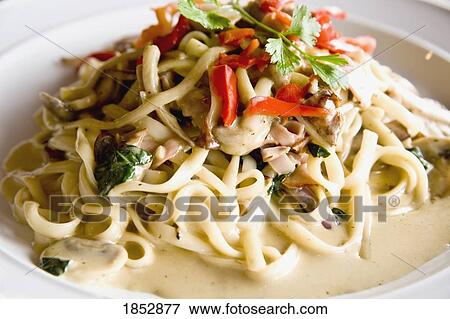 Stock Photo - Pasta; Pasta fettucini with cream sauce . Fotosearch