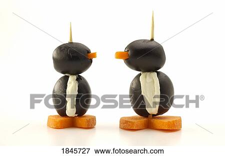 Stock Photo - Penguins made of olives, cream cheese and carrots; Appetizers. Fotosearch