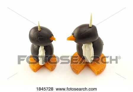 Stock Photo - Penguins made of olives, cream cheese and carrots; Appetizers. Fotosearch