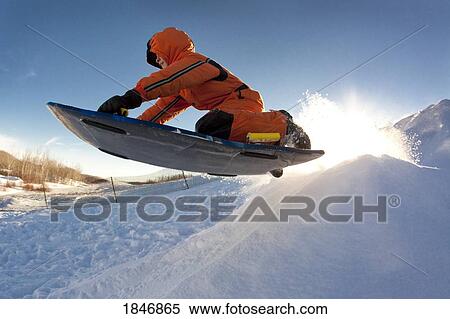 Person tobogganing View Large Photo Image Stock Photography - Person tobogganing. Fotosearch