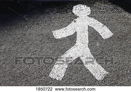 Stock Image - Pictogram of man walking on pedestrian crossing. Fotosearch