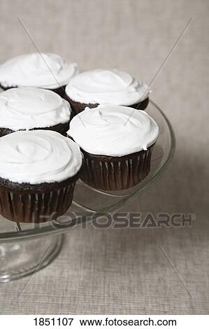 Plate of cupcakes View Large Photo Image Stock Photo - Plate of cupcakes. Fotosearch