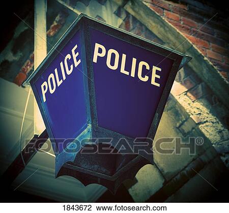 Stock Image - Police sign outside police station. Fotosearch