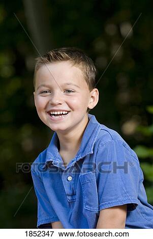 Stock Photo - Portrait of a boy; Boy smiling. Fotosearch