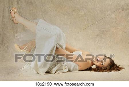 Portrait of a woman; Woman with white dress View Large Photo Image Stock Image - Portrait of a woman; Woman with white dress. Fotosearch