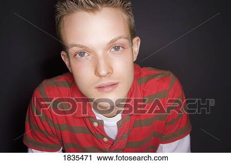 Stock Image - Portrait of a young man. Fotosearch
