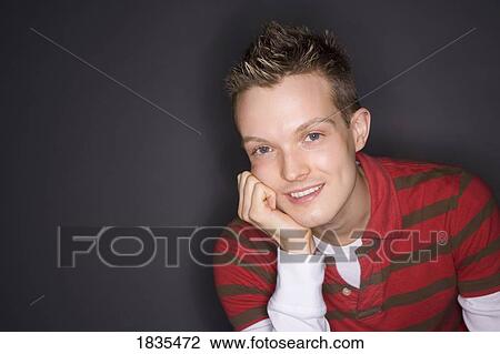 Stock Image - Portrait of a young man. Fotosearch