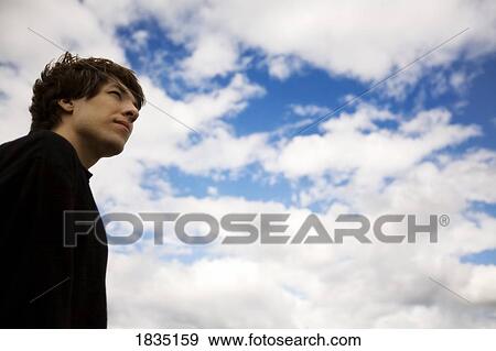 Portrait of a young man View Large Photo Image Stock Photo - Portrait of a young man. Fotosearch