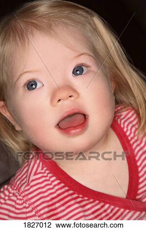 Stock Image - Portrait of young girl. Fotosearch