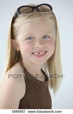 Stock Image - Portrait of young girl. Fotosearch