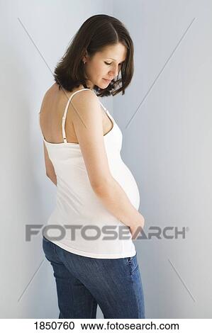 Pregnancy; Portrait of a pregnant woman View Large Photo Image Stock Image - Pregnancy; Portrait of a pregnant woman. Fotosearch