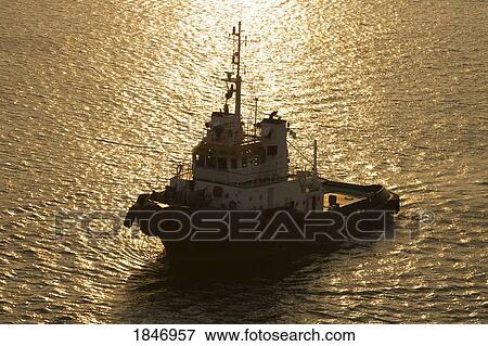 Stock Photo - Puerto Quetzal, Guatemala, Central America; Tug boat . Fotosearch