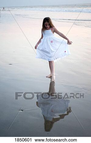 Stock Image - Puerto Vallarta, Mexico; Girl on the beach. Fotosearch