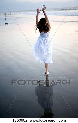 Puerto Vallarta, Mexico; Girl playing on the beach View Large Photo Image Stock Image - Puerto Vallarta, Mexico; Girl playing on the beach. Fotosearch
