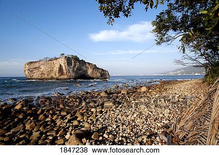Stock Photo - Puerto Vallarta, Mexico; Rocky beach and island . Fotosearch