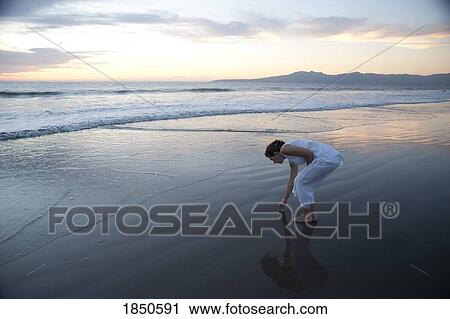 Stock Image - Puerto Vallarta, Mexico; Woman on the beach . Fotosearch