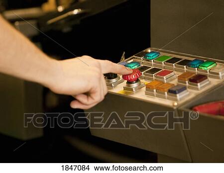 Picture - Pushing buttons. Fotosearch
