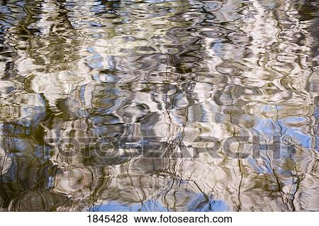 Stock Photo - Reflection in rippled water. Fotosearch