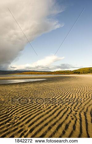 Stock Image - Rippled sand on a beach, Argyll and Bute, Scotland. Fotosearch