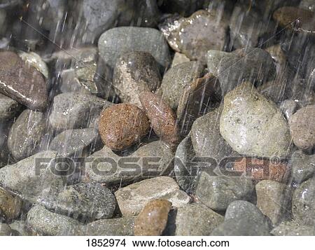 Rocks; Raining on rocks View Large Photo Image Picture - Rocks; Raining on rocks. Fotosearch