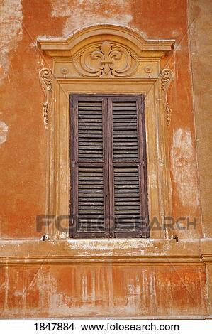 Picture - Rome, Italy; One window with shutters. Fotosearch