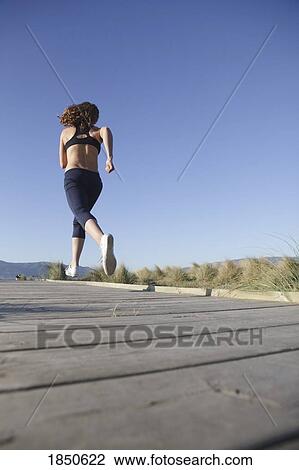Running on the sidewalk View Large Photo Image Stock Image - Running on the sidewalk. Fotosearch