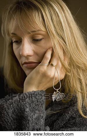 Stock Image - Sad woman. Fotosearch