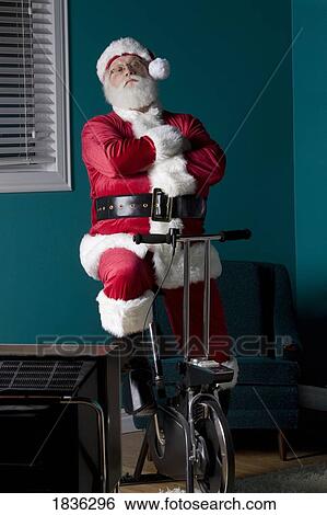 Santa refusing to exercise View Large Photo Image Stock Photograph - Santa refusing to exercise. Fotosearch