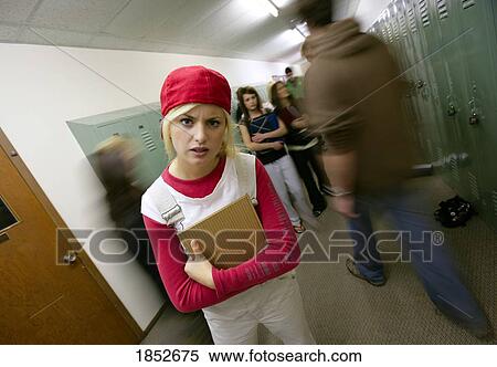School life; Unhappy girl in school hallway View Large Photo Image Stock Photography - School life; Unhappy girl in school hallway. Fotosearch