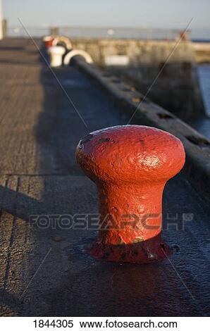Seahouses, Northumberland, England; Mooring bollard on a pier View Large Photo Image Stock Photography - Seahouses, Northumberland, England; Mooring bollard on a pier. Fotosearch