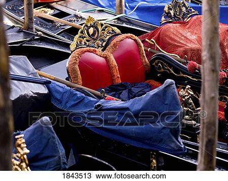 Stock Image - Seating in a gondola, Venice, Italy . Fotosearch